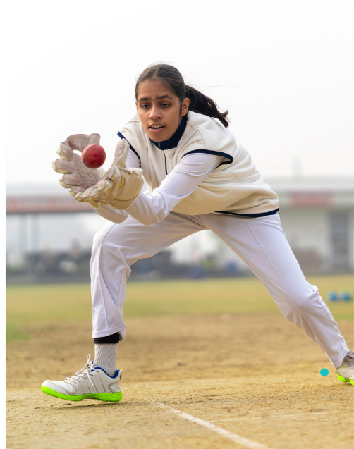 Girl catching cricket ball